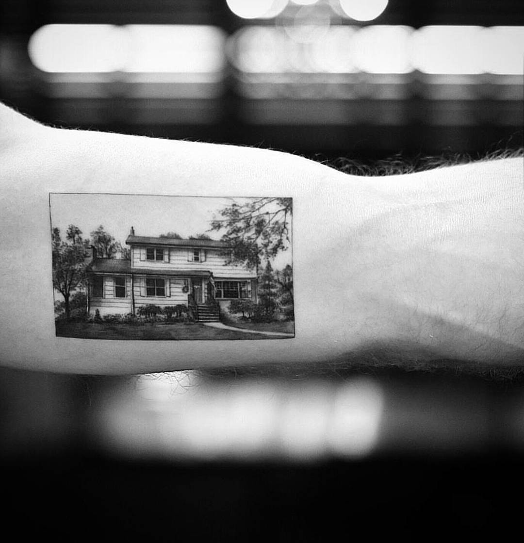 House tattoo by Dragon Ink