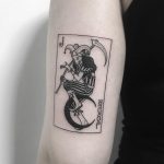 Joker card tattoo by Nudy tattooer
