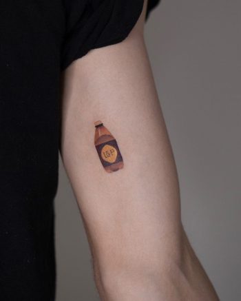 Little plastic bottle tattoo by Rey Jasper