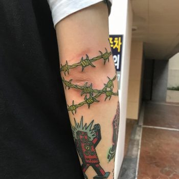 Nuclear green iron wire tattoo by Puff Channel