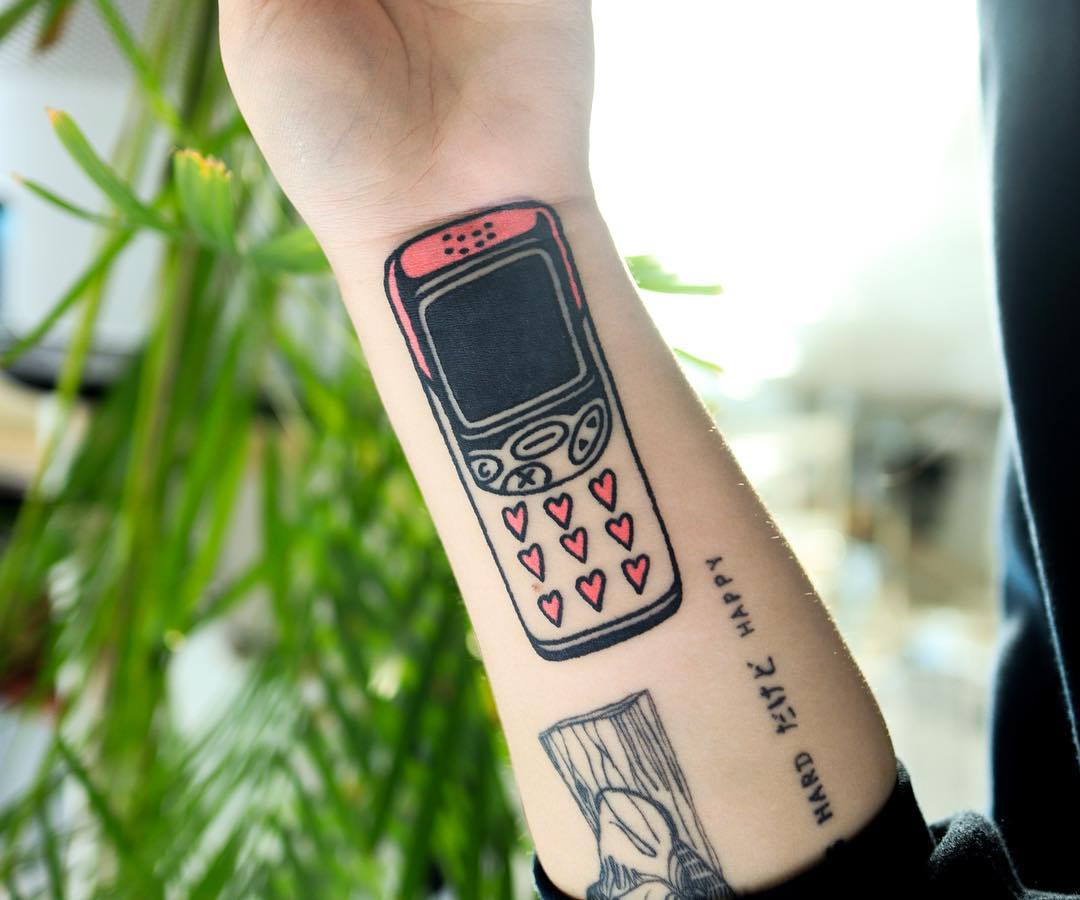 Phone cover-up tattoo by Puff Channel