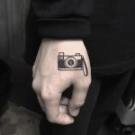 Photo camera tattoo by tattooist yeontaan