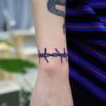 Purple barbed wire bracelet by Puff Channel