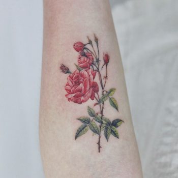 Red flower tattoo by tattooist Nemo