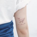 Small whale by tattooist Nemo