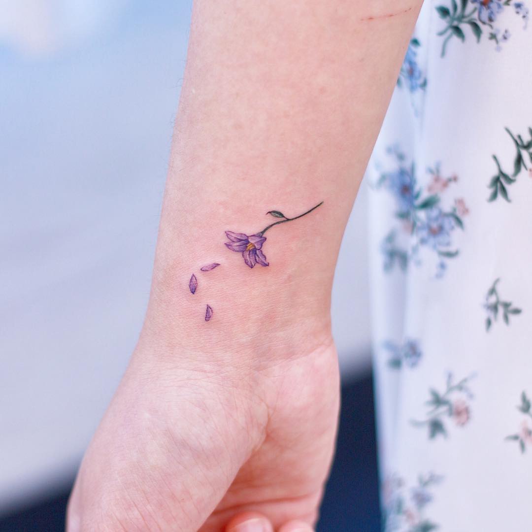 Solanum flower tattoo by tattooist Nemo