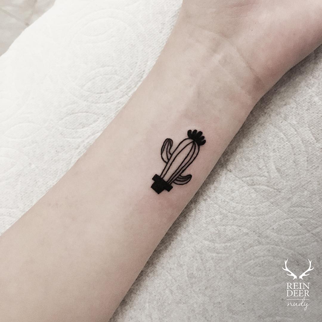 Tiny cactus by Nudy tattooer
