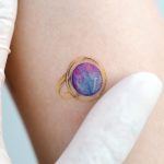Tiny vintage ring tattoo by Studio Bysol
