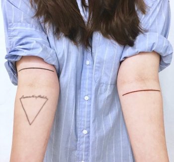 Two colored lines by tattooist Nemo