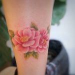 Watercolor camellia tattoo by tattooist G.NO