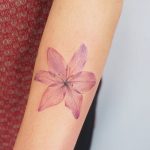 Watercolor lily by tattooist G.NO
