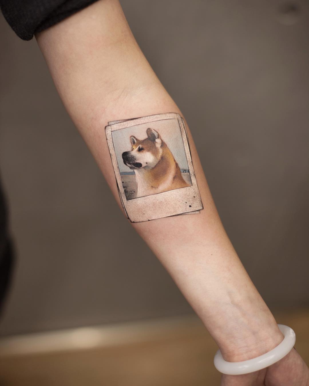 Akita memories tattooed on the left forearm by tattooist Chenjie Related Ta...