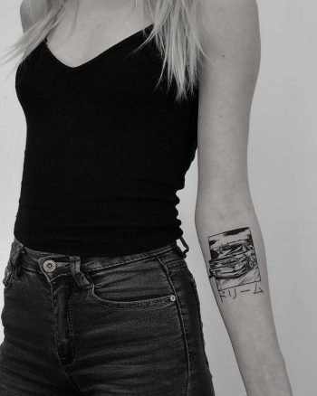 Black and white car tattoo by Krzysztof Szeszko
