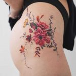 Delicate flowers on a hip by Rey Jasper