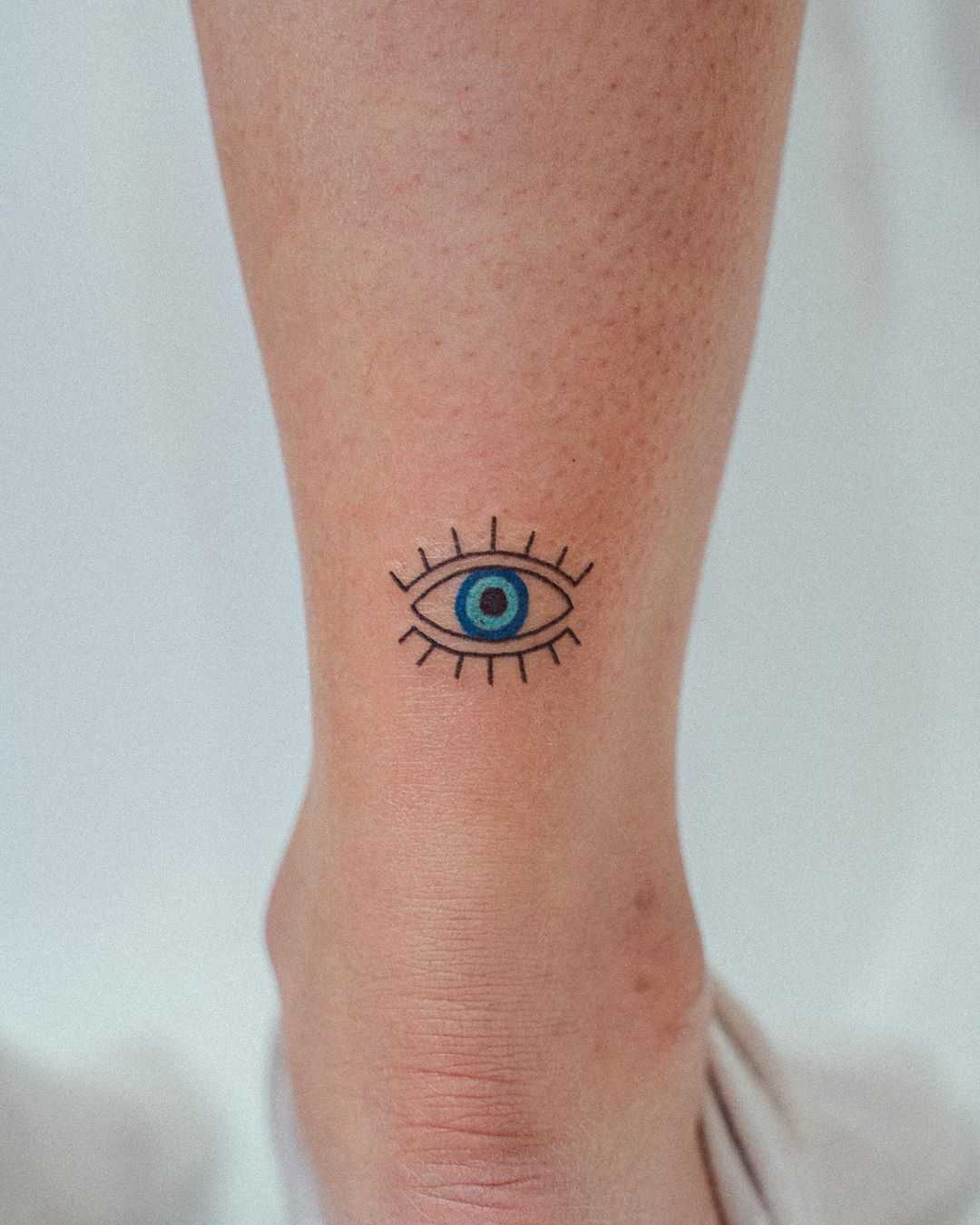 Evil eye tattoo by tattooist Bongkee inked on the right ankle | Evil eye tattoo, Third eye