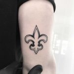 Fleur-de-lis tattoo by Loughie Alston