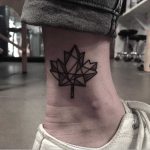 Geometric maple leaf by tattooist yeontaan