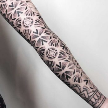 Geometric sleeve tattoo by Remy B