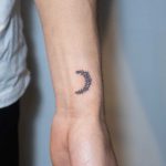 Hand-poked moon by tattooist Bongkee