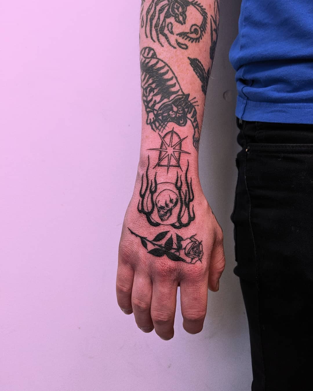 Hand tattoos by Tristan Ritter