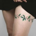 Leaves around a thigh by Rey Jasper