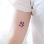 Letter S tattoo by tattooist Nemo