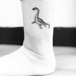 Little Loch Ness Monster tattoo by Jake Harry Ditchfield