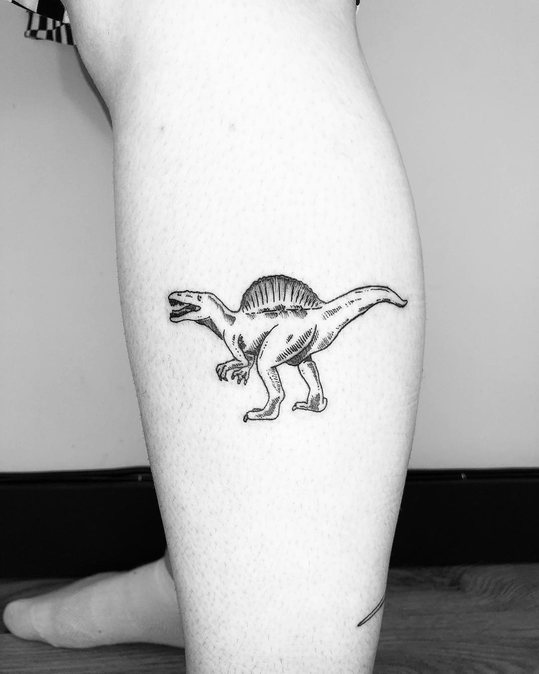 Little Spinosaurus tattoo by Jake Harry Ditchfield