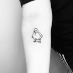 Little baby duckling tattoo by Jake Harry Ditchfield