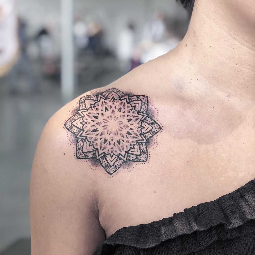Mandala on the right shoulder by Remy B