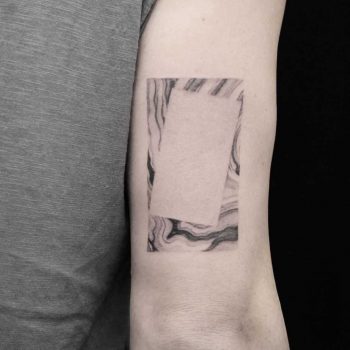 Negative space marble tattoo by Aga Kura