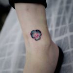 Pansy pendant tattoo by Studio Bysol