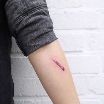 Pink crayon tattoo by tattooist Nemo