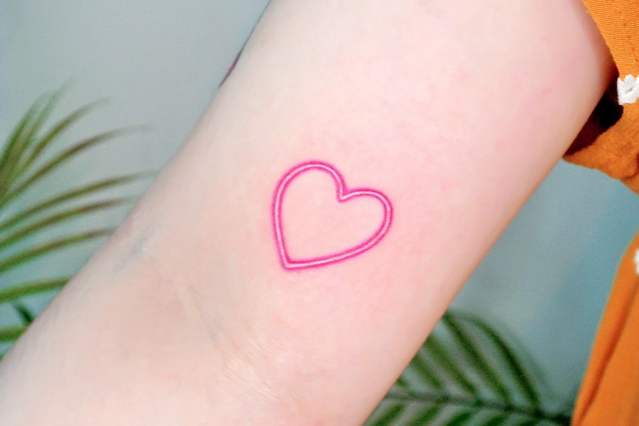 Pink heart by tattooist Cozy