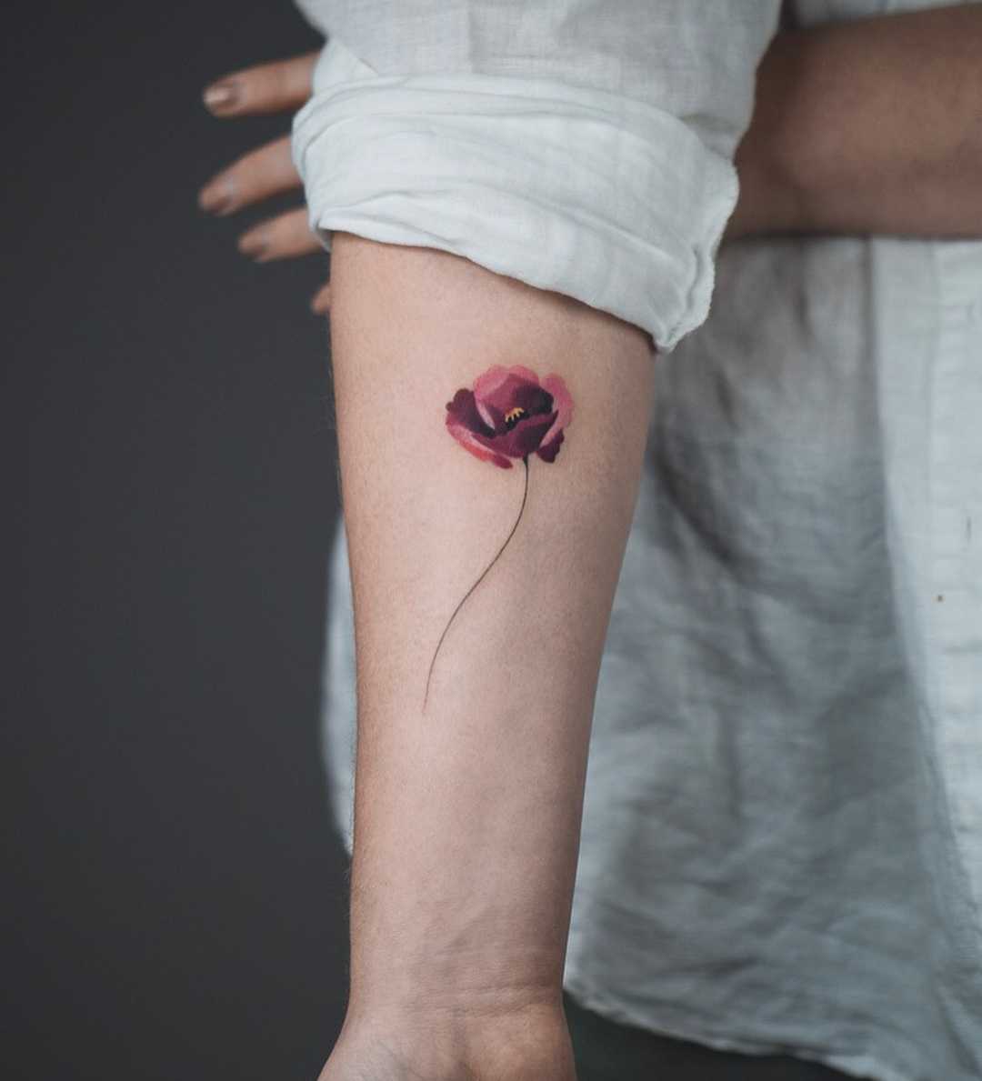 Poppy flower tattoo by Rey Jasper