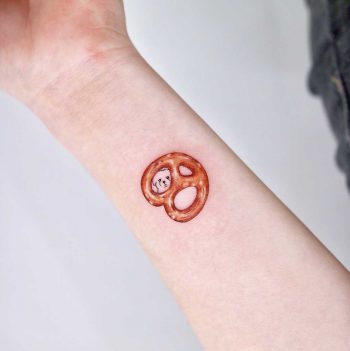 Pretzel and a puppy by tattooist Nemo