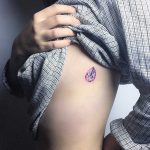 Purple gem tattoo by tattooist Nemo
