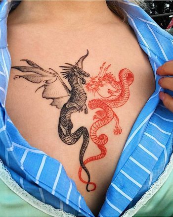 Red and black dragon tattoo by tattooist Oozy