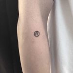 Registered trademark symbol ® tattoo by tattooist yeontaan