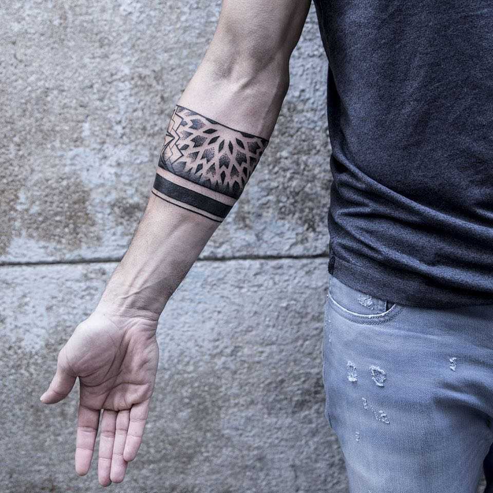 Sacred geometry armband tattoo by Remy B