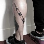 Saturn V tattoo by tattooist Oozy