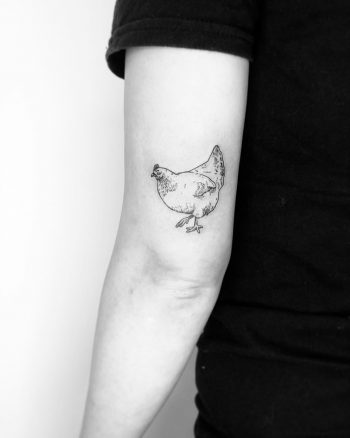 Small chicken tattoo by Jake Harry Ditchfield