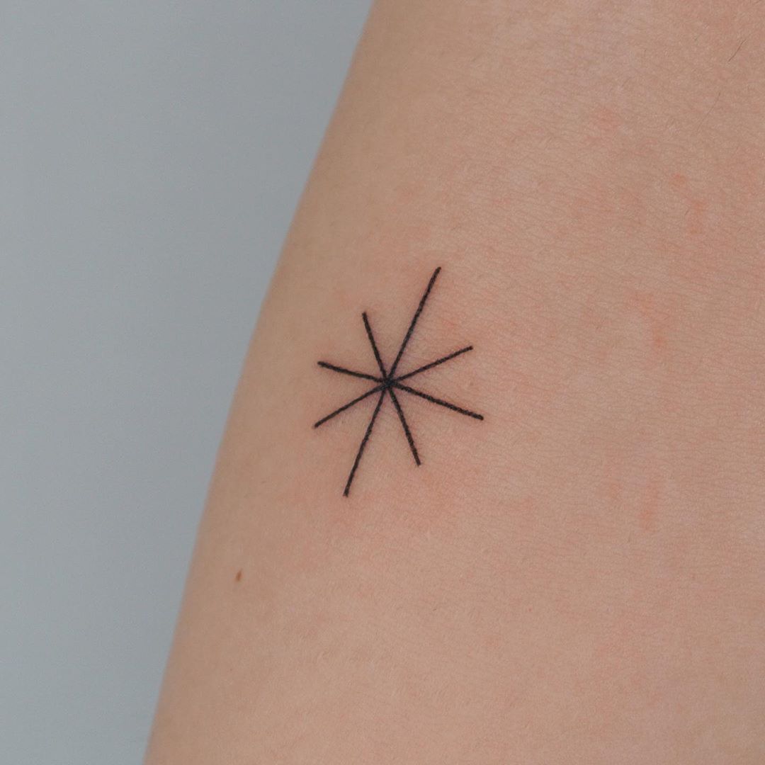 Sparkle tattoo by tattooist Cozy