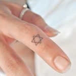 Star of David tattoo by tattooist Cozy