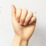 Three dots tattoo by tattooist Cozy