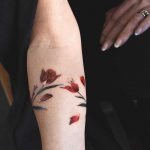 Tulip and lavender armband tattoo by Rey Jasper