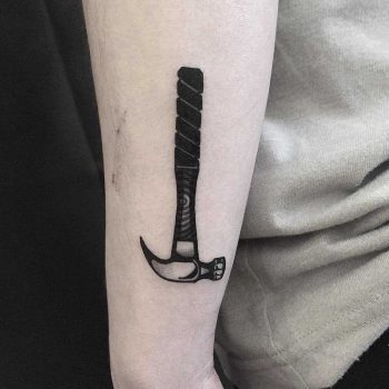 Upside down hammer tattoo by tattooist yeontaan