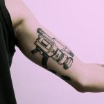 Vx47 camera tattoo by Tristan Ritter