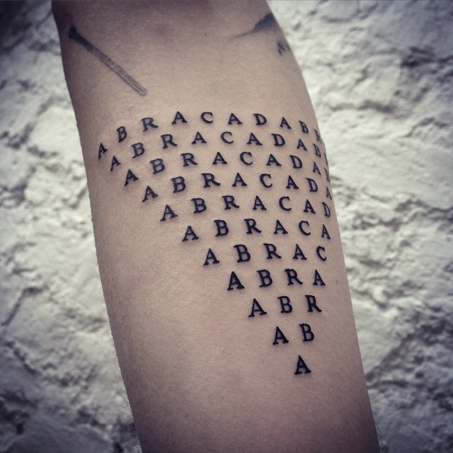 Abracadabra tattoo by tattooist MAIC