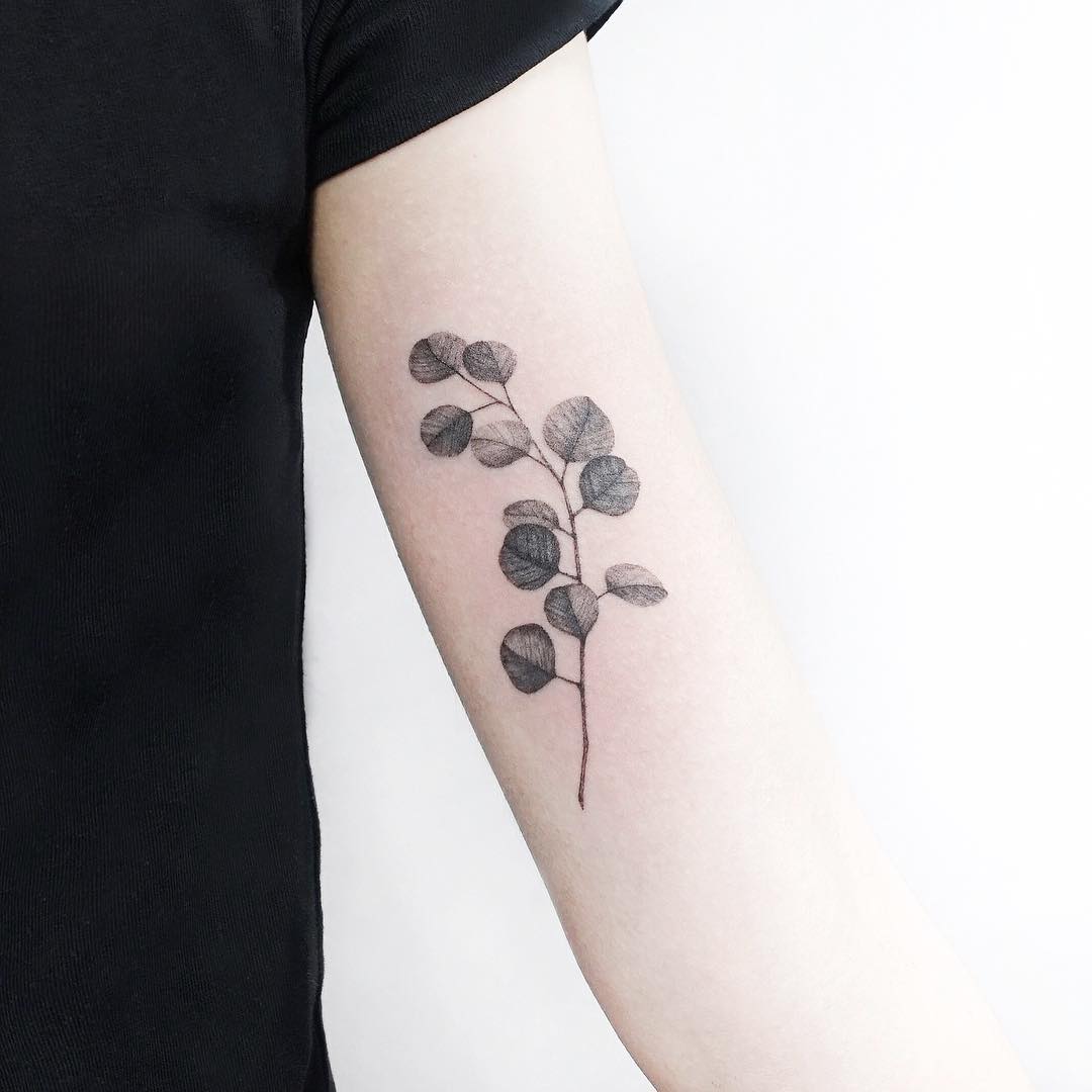 Black and grey eucalyptus by tattooist Ida